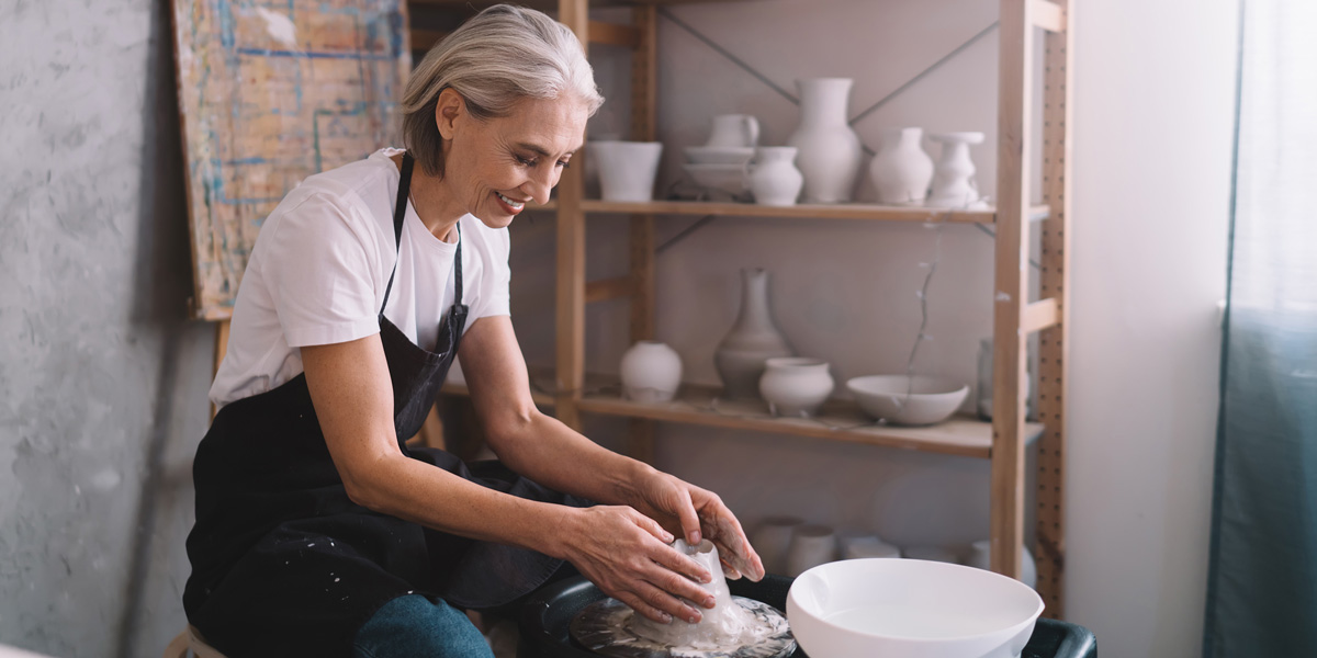 Woman making pottery