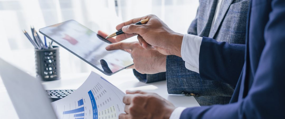 Business people reviewing documents